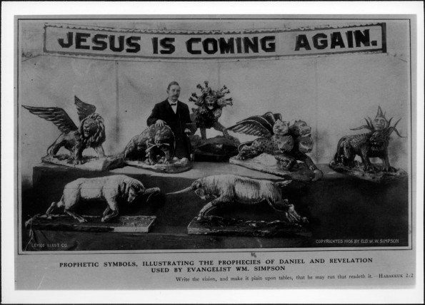 William Ward Simpson posing with papier mache beasts