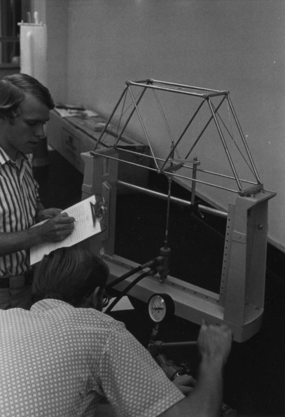 Walla Walla College mechanical engineering students studying bridge construction