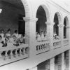 Battle Creek Sanitarium patients in wheelchairs on a covered portico