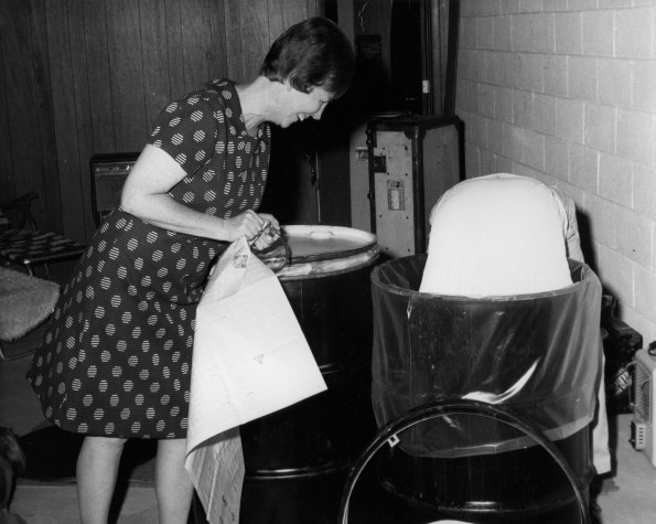 Mr and Mrs Gregg Pack for Tanzania. (Mr Gregg is almost packing himself in the barrel of dishes.)