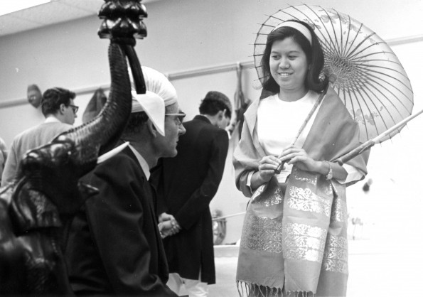 Mavis Ohn chats with Elder Myrl Manley as part of the World Mission Exhibit at Andrews University Feb. 21 thru Mar. 1, 1967