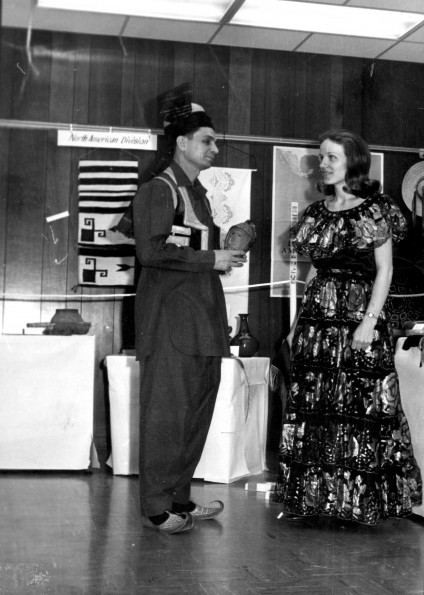 Patricia Cruz and an unknown participant chat as part of the World Mission Exhibit at Andrews University Feb. 21 thru Mar. 1, 1967