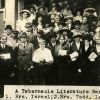 A literature band posing on the front steps of the Dime Tabernacle
