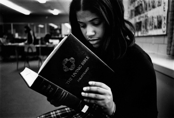 Andrews Academy student reading the Bible