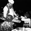 Andrews University president Joseph Grady Smoot serving students pizza