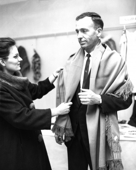 Werner and Nancy Vyhmeister with a piece of clothing from the Middle East as part of the World Mission Exhibit at Andrews University Feb. 21 thru Mar. 1, 1967