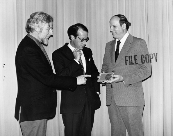 Robert Rhodes James is presented the Andrews University centennial medallion by Joseph Grady Smoot