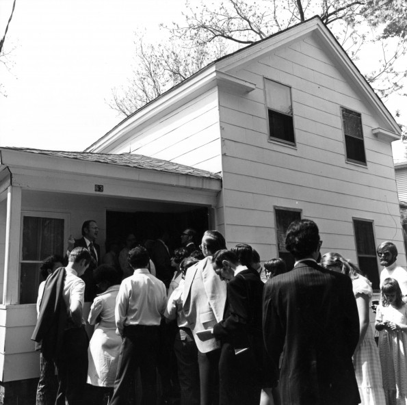 A group of students with Mervyn Maxwell outside of Ellen G. White's Wood Street home in Battle Creek, Michigan