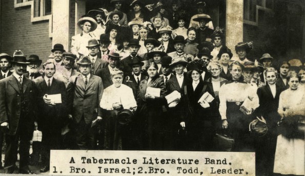A literature band posing on the front steps of the Dime Tabernacle