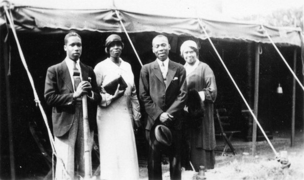 Joseph H. Laurence with assistant workers