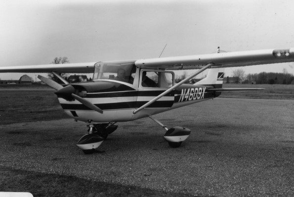 Wendell Cole shows Terry Cowell some of the instruments of the plane at Andrews University Airport