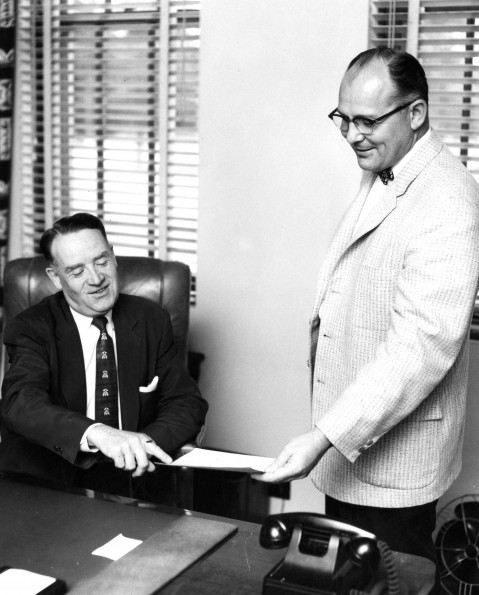 Andrews University president Floyd O Rittenhouse talking to Vernon Edward Garber