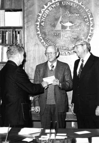 Andrews University president Richard L Hammill recieved a donation on behalf of the university