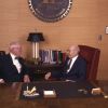W. Richard Lesher and Floyd Rittenhouse converse at Andrews University president's office