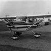 Wendell Cole shows Terry Cowell some of the instruments of the plane at Andrews University Airport