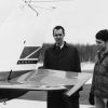 William Barney and Tom Candy inspecting a plane's elevator at Andrews University airport