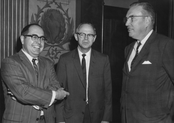 Andrews University president Richard L Hammill with two unknown community leaders