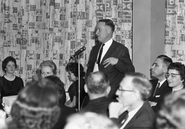 Andrews University president Floyd O Rittenhouse speaking to a group