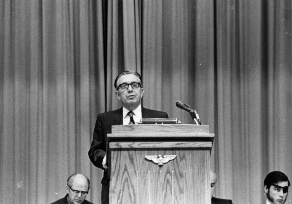 Andrews University dean of College division Warner E. McClure at the podium