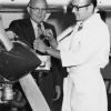 Vernon Edward Garber visited the Andrews University Airport aviation department while Alfred Fox was maintaing a plane engine