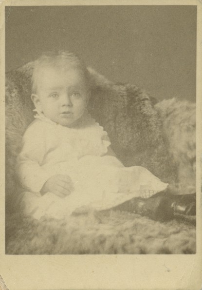 Winnie Waggoner sitting on a sofa