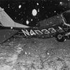 Plane wreckage in a snowy field near Andrews University Airport
