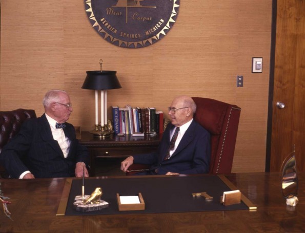 W. Richard Lesher and Floyd Rittenhouse converse at Andrews University president's office