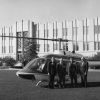Bell Jet Ranger helicopter landed with participants at the Andrews University council fly-in in front of  Andrews University Administration building