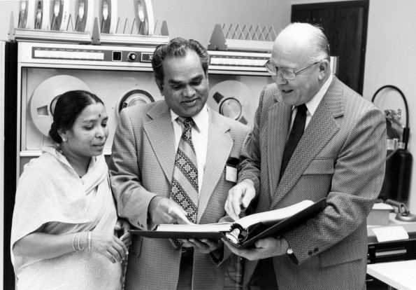 Vernon Edward Garber conducts R. P. Nath and his wife through the Andrews University Computing Center