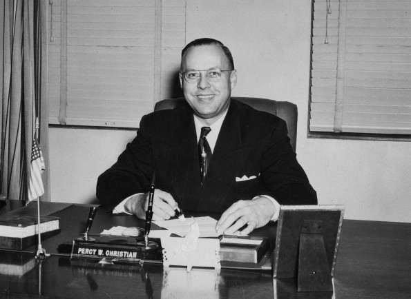 Emmanuel Missionary College president Percy Willis Christian sitting in the presidental office