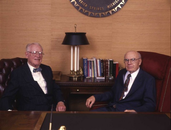 W. Richard Lesher and Floyd Rittenhouse converse at Andrews University president's office