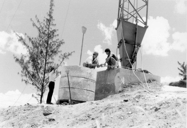 [Reinhold Grellman and Brook Powers work on the attachments for antenna #1 at Adventist World Radio-Asia in Guam]