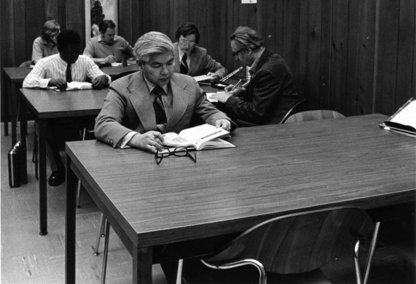 [Sakae Kubo studies at the James White Library]