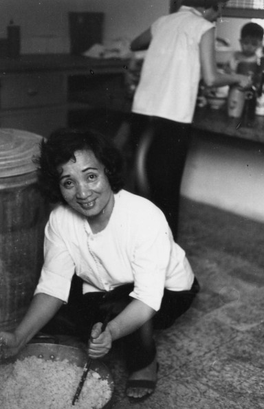 Andrews University Alumni Mrs. Thien cooks rice by the barrelful.