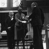 [Natelkka E. Burrell receiving an award from Richard Hammill during Andrews University's 1973 alumni homecoming]