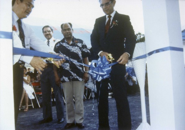 [Governor Joseph Ada and Neal C. Wilson cutting the ribbon at the Adventist World Radio-Asia dedication]