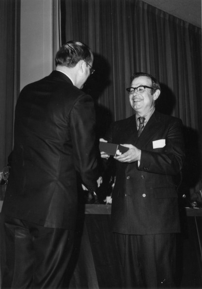 [Daniel Augsburger receives a service award for 30 years of service to Andrews University]