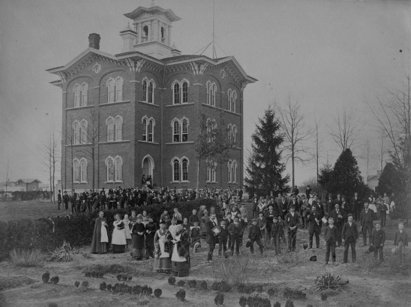 An assembly of students, faculty, and their families at Battle Creek College