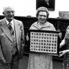 [Emmett Vande Vere, Mary Jane Mitchell, and Louise Dederen with a new acquisition for the Andrews University Heritage Room]