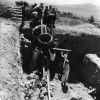 [Siegfried Horn and other archaeologists pulling a stone vat out of one of the squares at the archaeological site of Shechem]