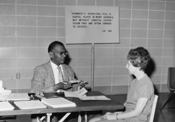 [Charles Thomas discusses Shahin Ilter's fitness evaluation with her]