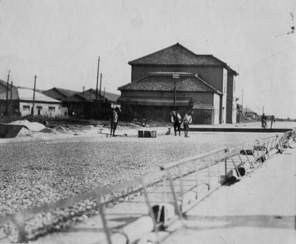 Chinese workers building a road