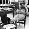 [Charles Satterfield reading in the James White Library]