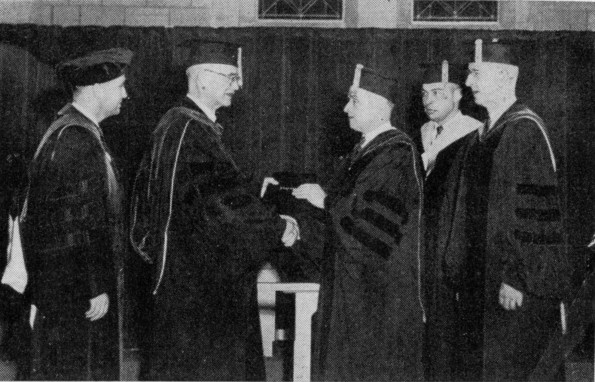 [H.M.S. Richards receives honorary doctorate of theology from Andrews University at the August 1960 commencement ]
