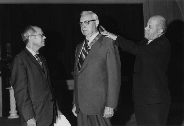 [William G.C. Murdoch receives the Medallion of Merit]