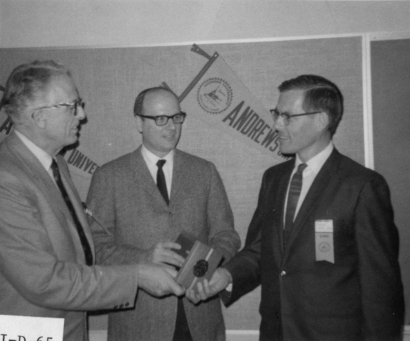 [Horace Shaw presents award for service to an Andrews University staff member]