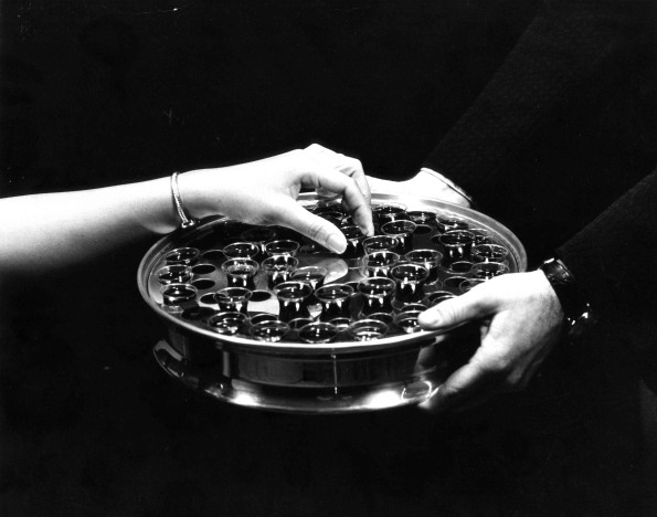 [Tray of grape juice used in communion service]