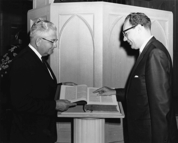 [John A. Kroncke and elder Morel]