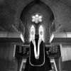[C. Warren Becker plays the organ at a dedication service at Pioneer Memorial Church]