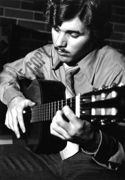 [Andrews Christian Youth Action's Bob Fredericks plays guitar]